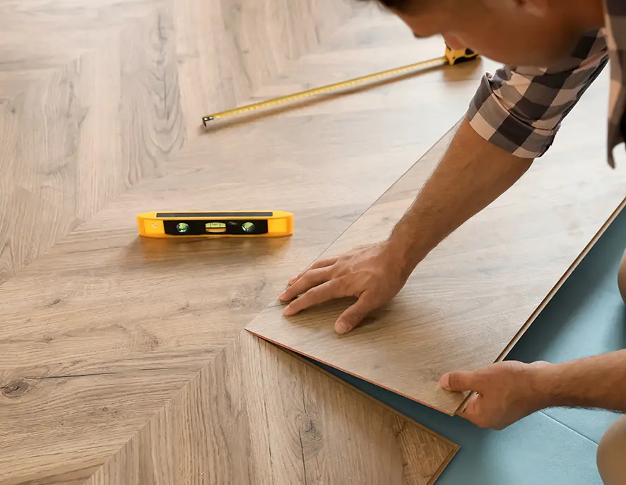 Engineered hardwood flooring close-up showing rich wood grain texture